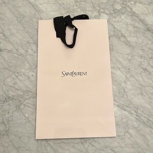 Saint Laurent paper shopping bag.
